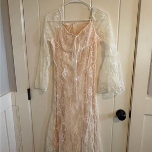 Elegant Lace Dress with Sheer Sleeves